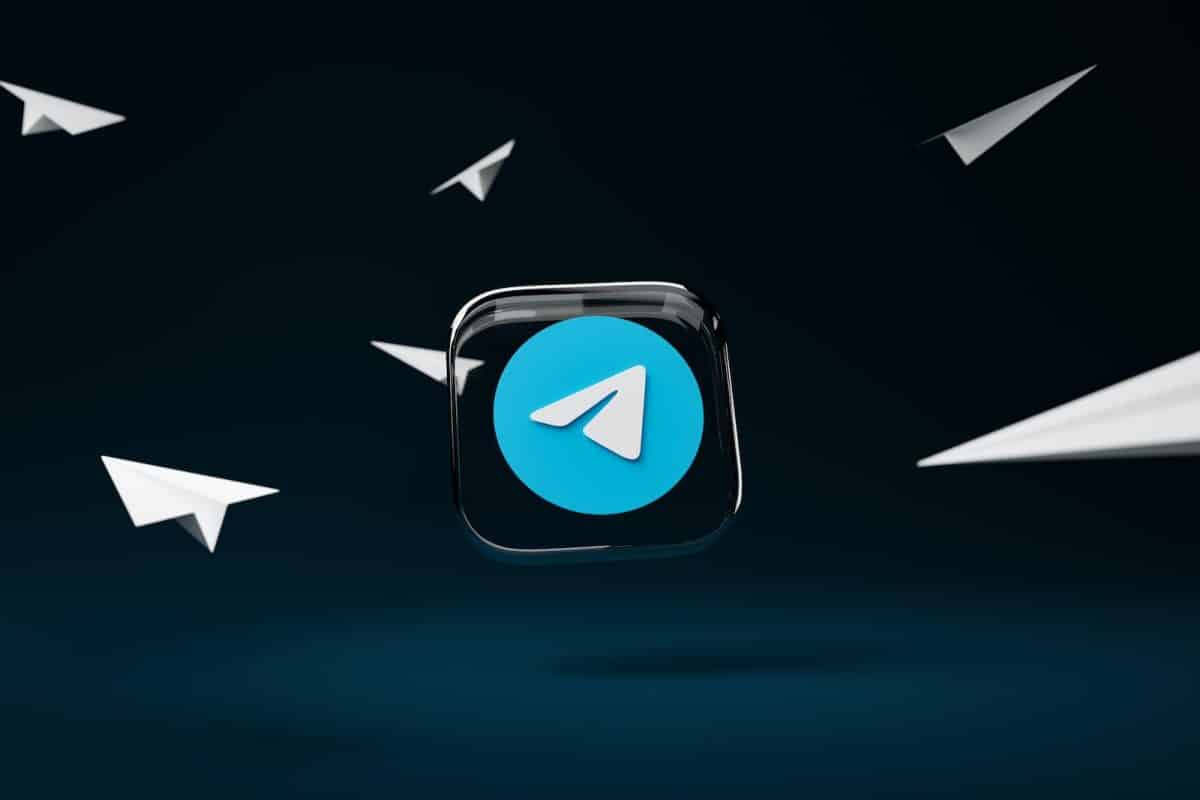 a blue button with a white arrow on it